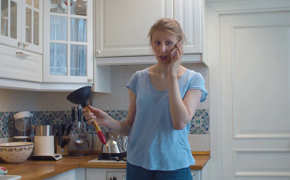 Put down the phone and grab your handy plunger. (zakharovs/Shutterstock)