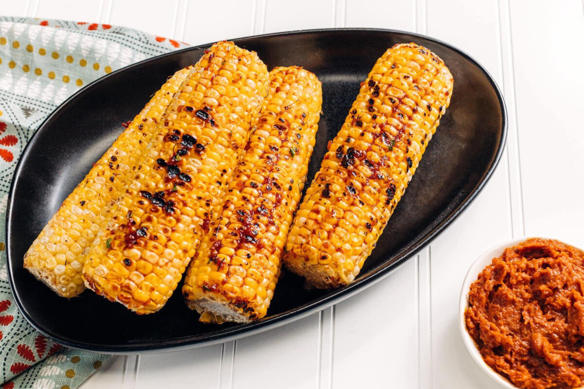 This easy grilled corn is  spicy and smoky. (Eberly Film Labs for The Daily Meal; Shannon Kinsella/food styling)