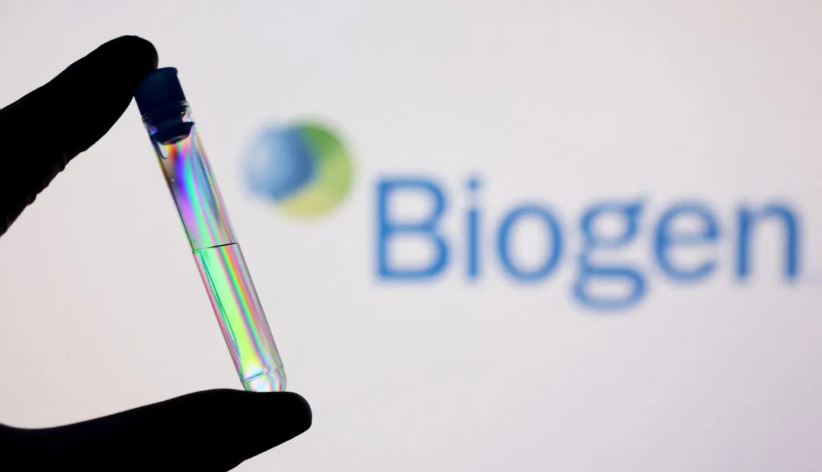 A test tube in front of displayed Biogen logo in this illustration taken, on Dec. 1, 2021. (Dado Ruvic/Illustration/Reuters)