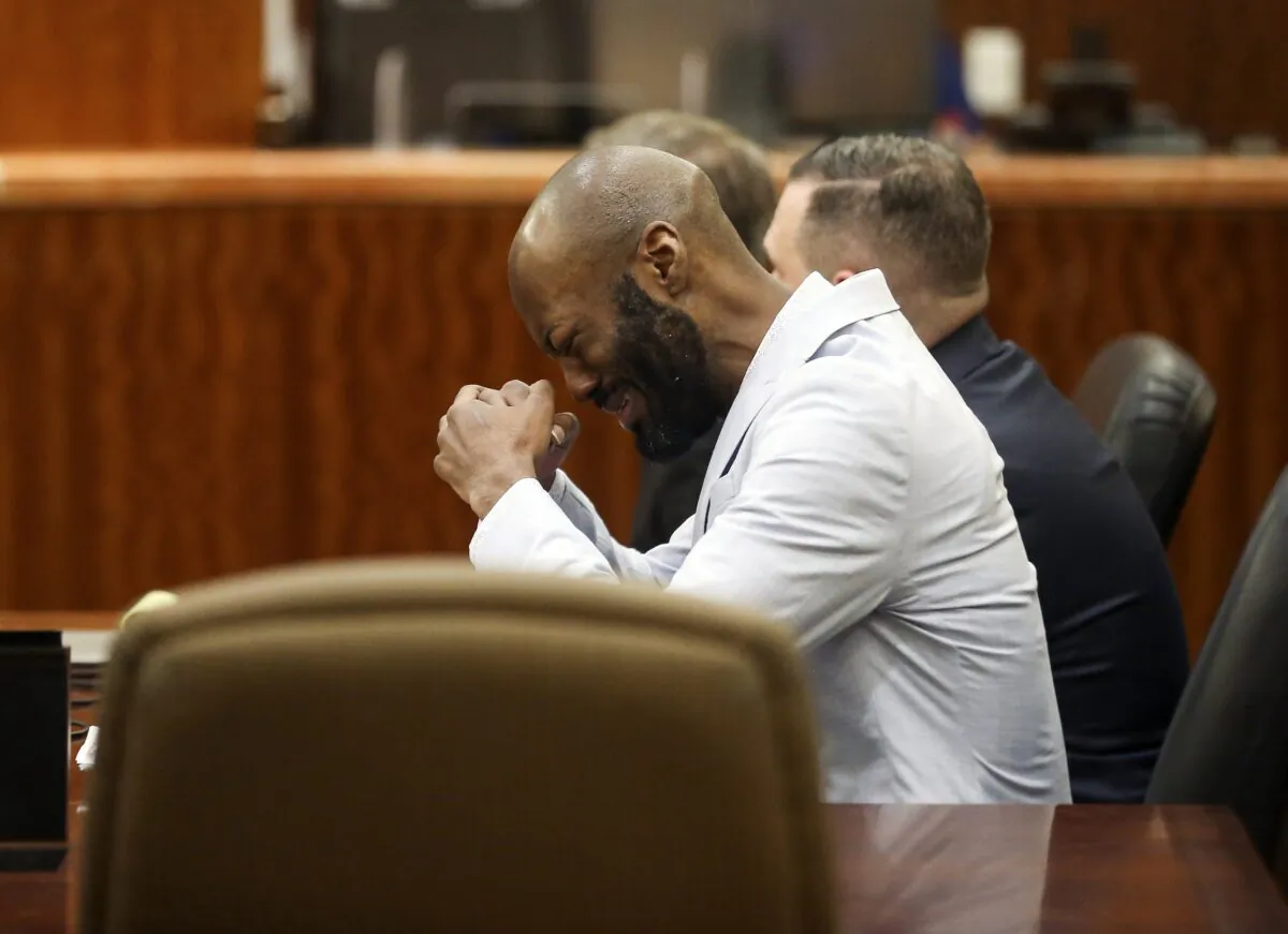 Andre Jackson reacts after the jury found him guilty of the fatal 2016 stabbing of 11-year-old Josue Flores at the Harris County Criminal Courthouse in Houston on May 3, 2022. (Godofredo A. Vásquez/Houston Chronicle via AP)