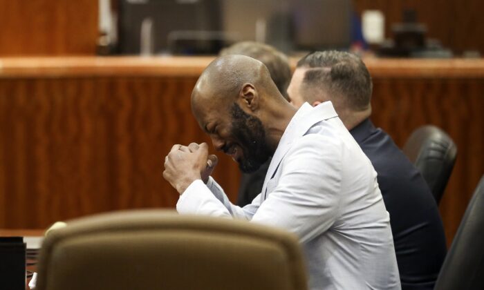 Andre Jackson reacts after the jury found him guilty of the fatal 2016 stabbing of 11-year-old Josue Flores at the Harris County Criminal Courthouse in Houston on May 3, 2022. (Godofredo A. Vásquez/Houston Chronicle via AP)