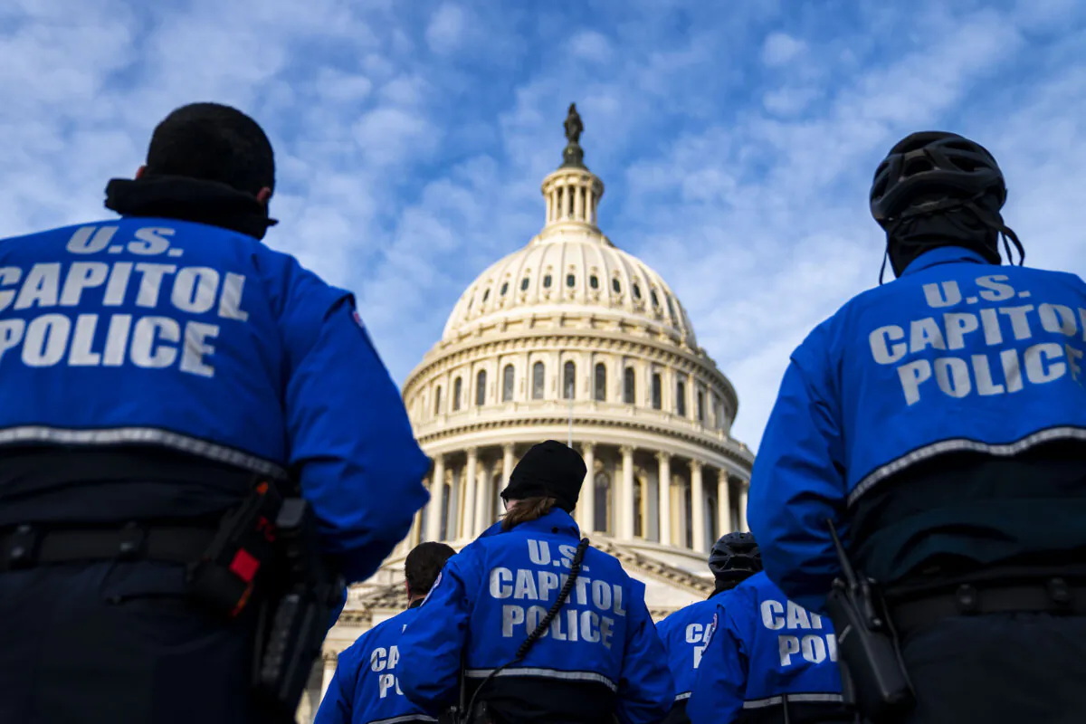 U.S. Capitol Police officers on the East Front Plaza after a morning roll call on Capitol Hill in Washington on Jan. 6, 2022. (Kent Nishimura/Los Angeles Times/TNS)