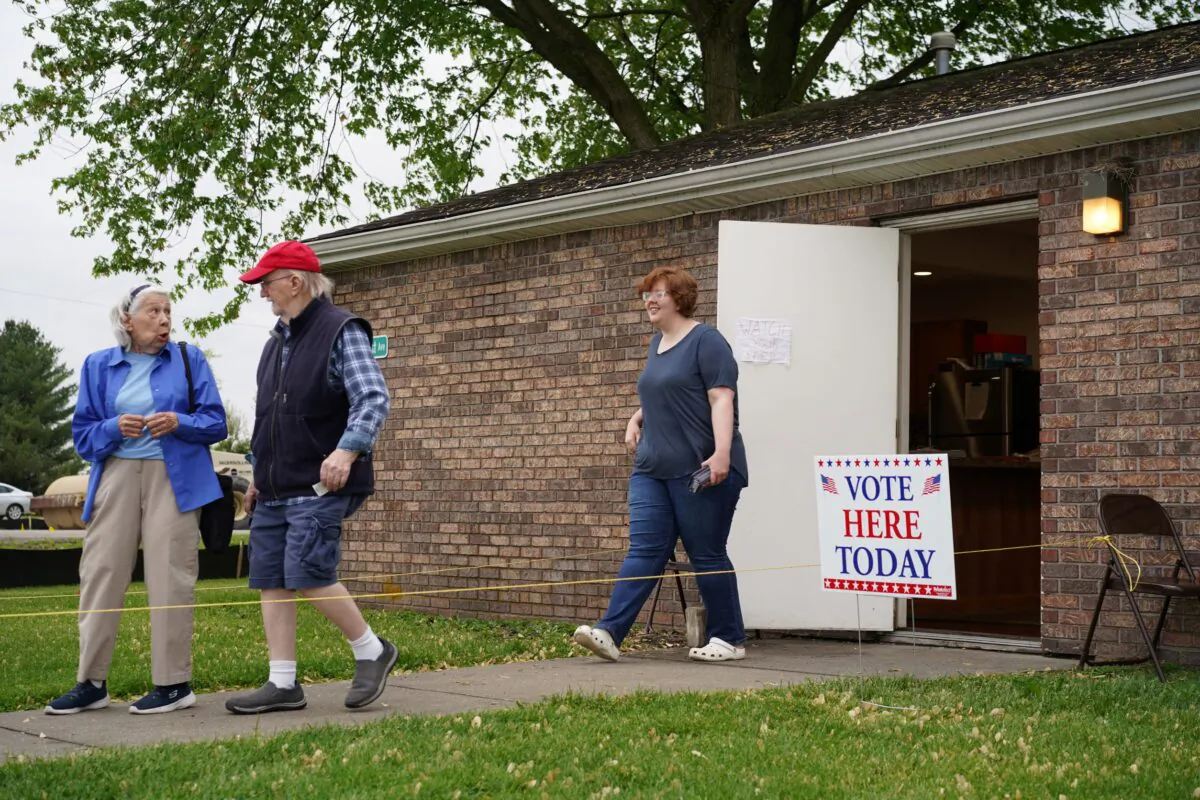 Voters head out from a voting site in rural Seymour in southern Indiana on May 3, 2022. (Cara Ding/The Epoch Times)