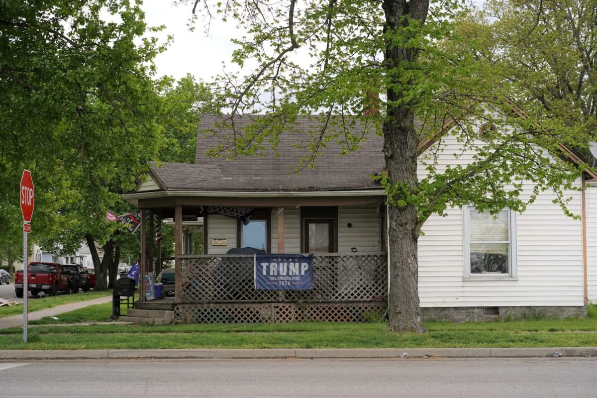 A Trump 2024 flag is seen hung outside a house in rural Seymour in southern Indiana on May 3, 2022. (Cara Ding/The Epoch Times)