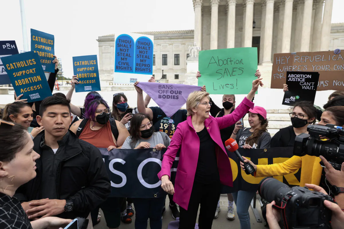 Sen. Elizabeth Warren (D-Mass.) speaks to pro-abortion demonstrators outside of the U.S. Supreme Court Building in Washington, on May 3, 2022. (Anna Moneymaker/Getty Images)