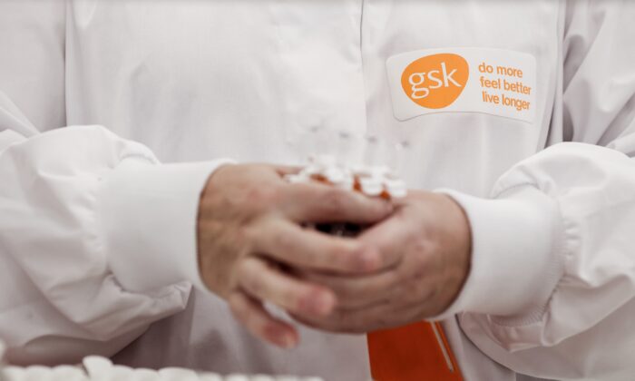 A GSK employee is at work at the factory of British  pharmaceutical company GlaxoSmithKline (GSK) in Wavre, Belguim, on Feb. 8, 2021. (Photo by Kenzo TRIBOUILLARD / AFP) (Photo by KENZO TRIBOUILLARD/AFP via Getty Images)