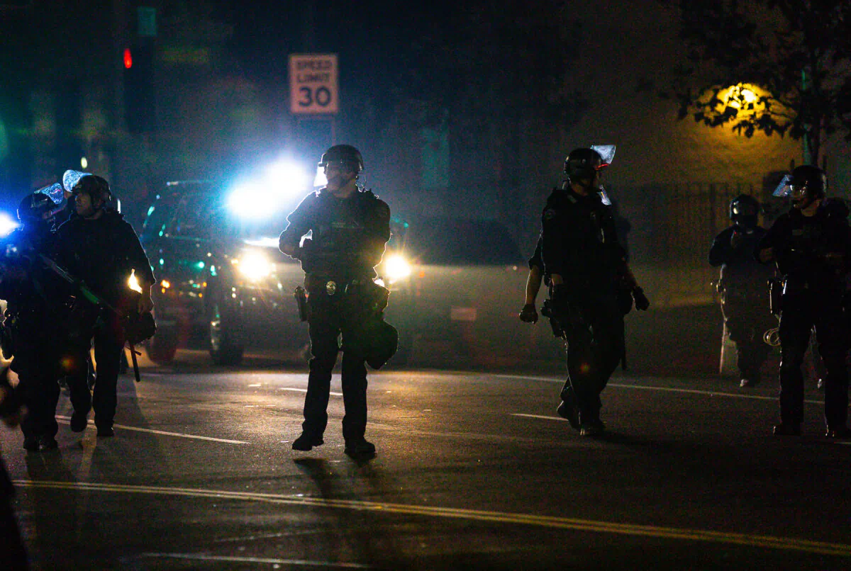 Los Angeles Police Department officers respond to civil unrest in a file photo. (John Fredricks/The Epoch Times)