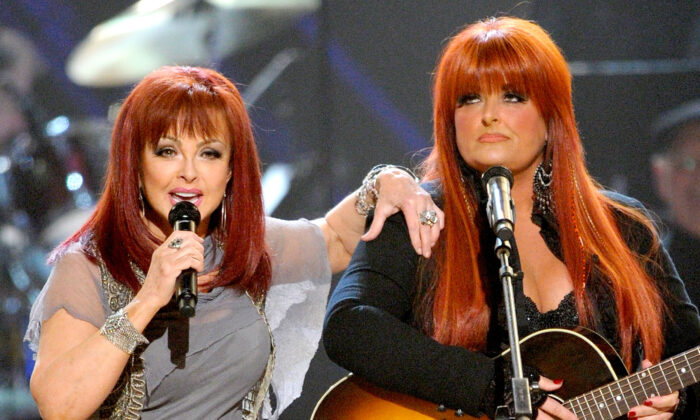 Musicians Naomi Judd (L) and Wynonna Judd perform onstage during ACM Presents: Girls' Night Out: Superstar Women of Country concert held at the MGM Grand Garden Arena in Las Vegas, on April 4, 2011. (Ethan Miller/Getty Images)