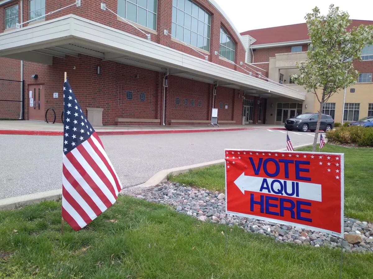 The voter turnout early in the day for the May 3 Primary Election was slow and low in northeast Ohio, according to poll workers. Here signs guide voters into Lincoln School in Lakewood, a large West Cleveland suburb.(Michael Sakal/The Epoch Times)