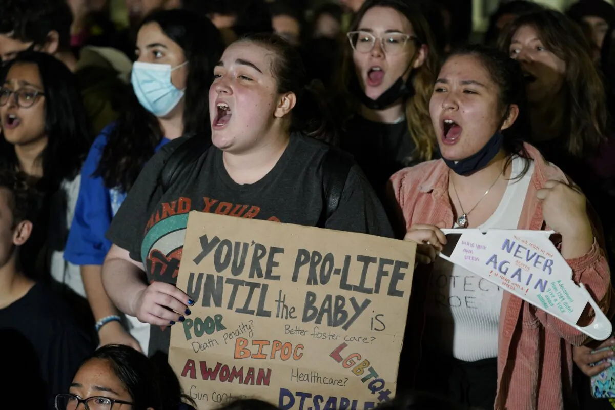 A crowd of people gather outside the Supreme Court in Washington early May 3, 2022. (Alex Brandon/AP Photo)