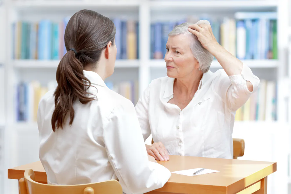 We know that most male hair loss is hormone driven. For women who lose hair, it’s often due to another type of hormonal problem, such as an underperforming thyroid or exhausted adrenal glands. (ShutterStock)