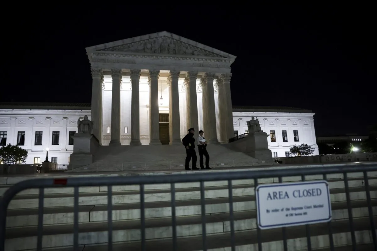 Fencing surrounds the Supreme Court in Washington on May 2, 2022. (Kevin Dietsch/Getty Images)