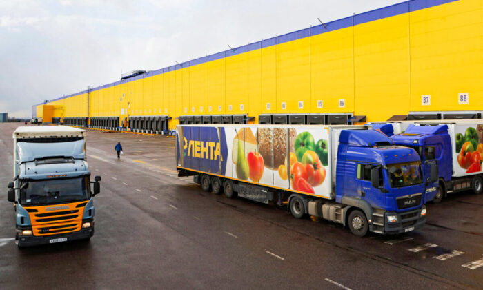 Trucks at a warehouse of Russian retailer Lenta in Leningrad Region, Russia on April 27, 2022. (Anton Vaganov/Reuters)