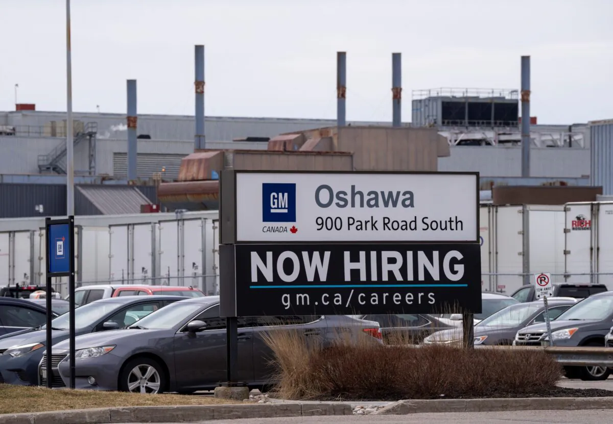 A sign announcing hiring at the General Motors facility in Oshawa, Ont., on April 4, 2022. (The Canadian Press/Frank Gunn)
