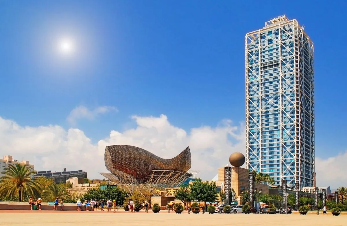Hotel Arts and Mapfre Tower and Peix sculpture in Port Olimpic on August 12, 2011 in Barcelona, Spain. (Andrij Vatsyk/Shutterstock)