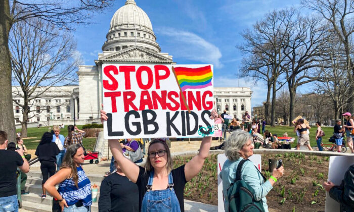 A protester denounces the "transing" of children at the state capitol in Madison, Wisconsin on April 23, 2022. (Courtesy of Charlie Jacobs (pseudonym))