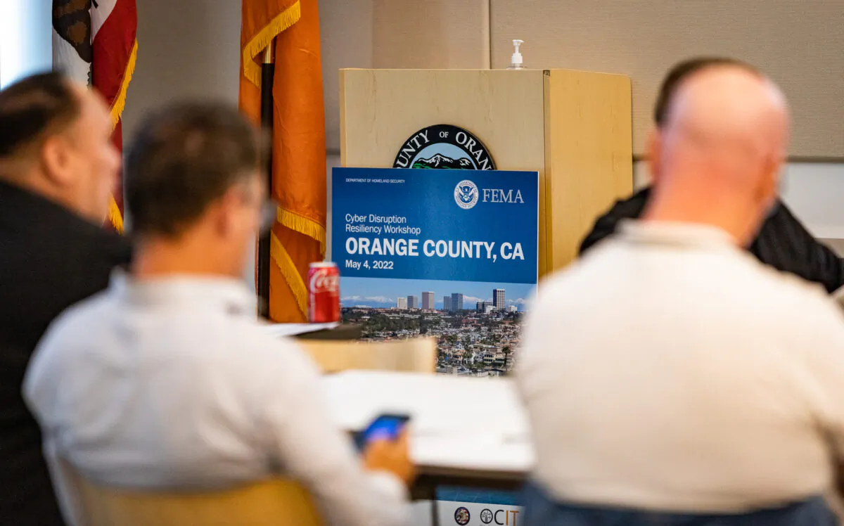 Attendees including emergency, civic, and rescue first responders partake in a cyber security seminar in Santa Ana, Calif., on May 4, 2022. (John Fredricks/The Epoch Times)