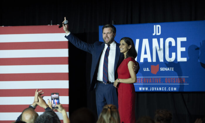 J.D. Vance, a Republican candidate for U.S. Senate in Ohio, and his wife Usha Vance wave to supporters after winning the Ohio Republican Senate primary election at an election night event at Duke Energy Convention Center in Cincinnati, Ohio, on May 3, 2022. (Drew Angerer/Getty Images)