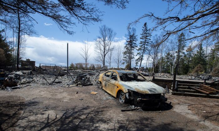 A fire-destroyed property registered to Gabriel Wortman at 200 Portapique Beach Road is seen in Portapique, N.S. on May 8, 2020. (The Canadian Press/Andrew Vaughan)