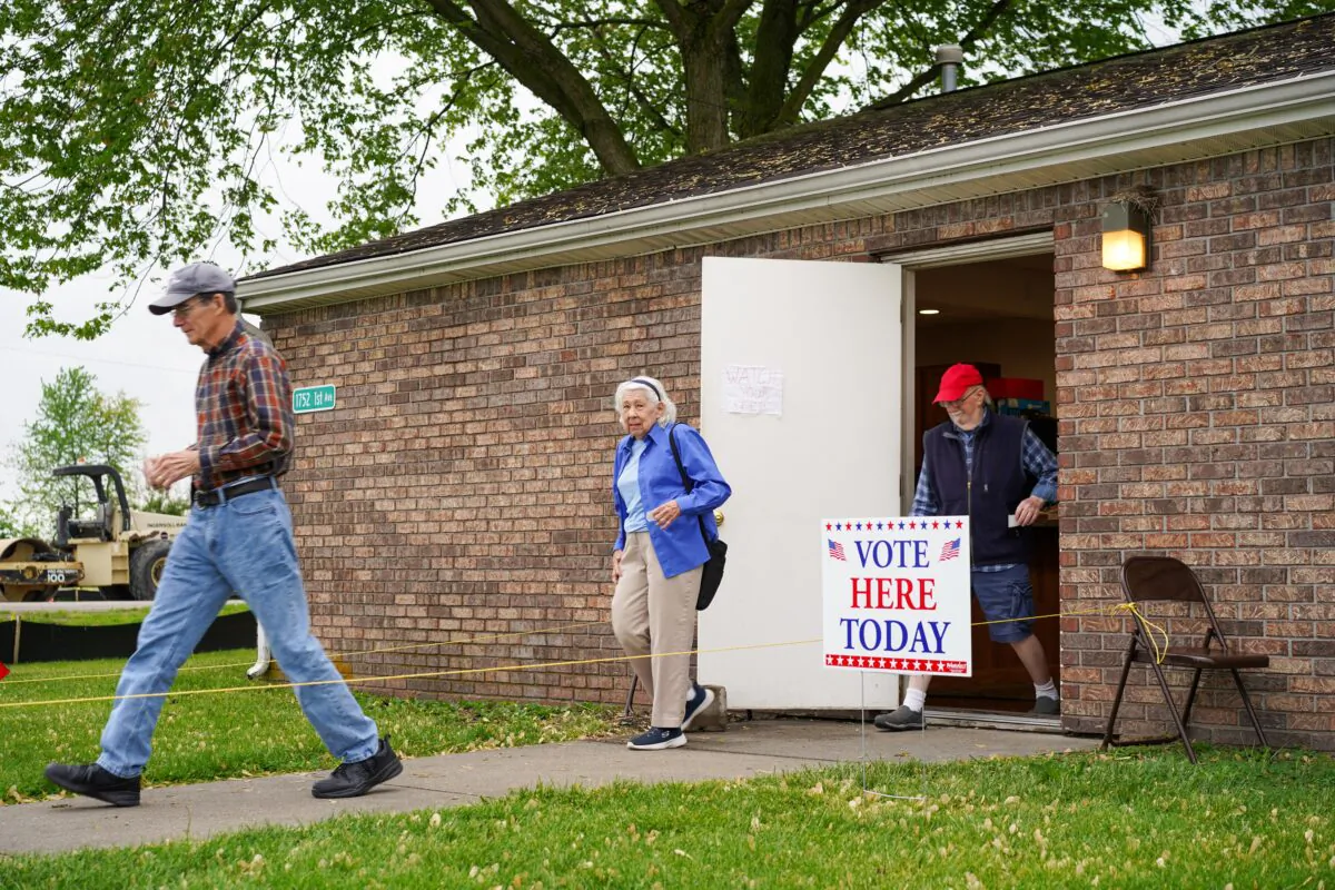 Voters head out from a voting site in rural Seymour in southern Indiana on the primary election day May 3, 2022. (Cara Ding/The Epoch Times)
