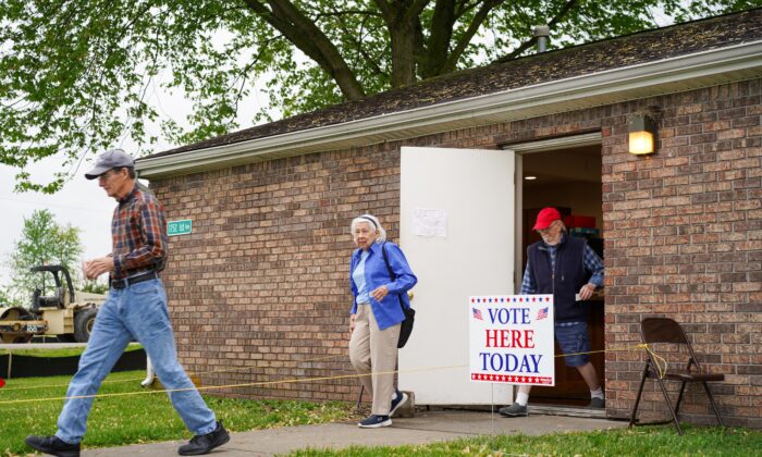 Voters head out from a voting site in rural Seymour in southern Indiana on the primary election day May 3, 2022. (Cara Ding/The Epoch Times)
