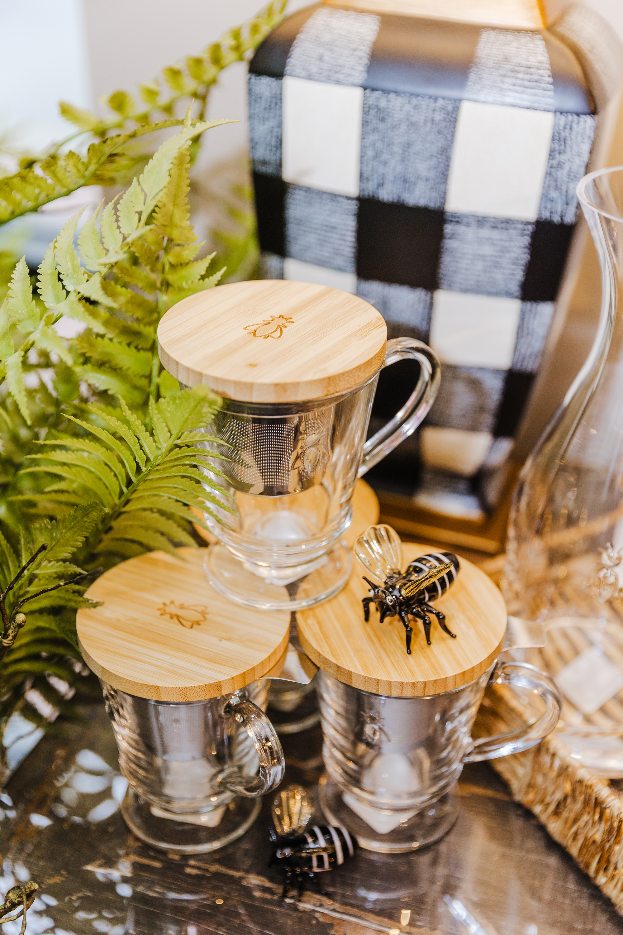 glass bees on tea cups