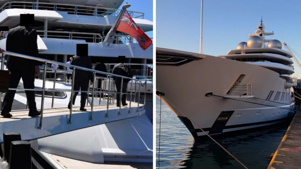 Fijian authorities execute a seizure warrant freezing the superyacht named "Amadea" docked at Queens Wharf in Lautoka, Fiji, on May 5, 2021. (U.S. Department of Justice)
