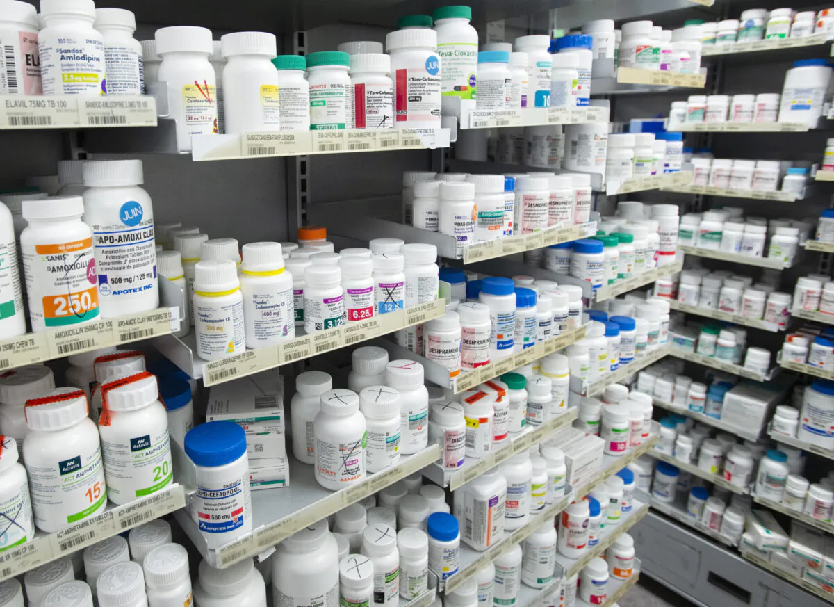Prescription drugs sit on shelves at a pharmacy in Montreal on March 11, 2021. (The Canadian Press/Ryan Remiorz)