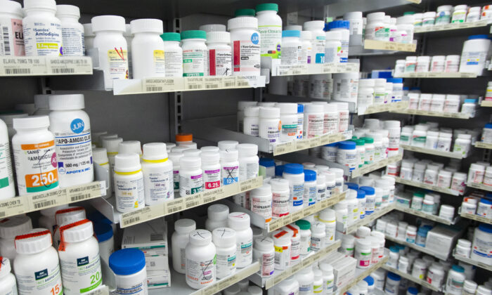 Prescription drugs sit on shelves at a pharmacy in Montreal on March 11, 2021. (The Canadian Press/Ryan Remiorz)