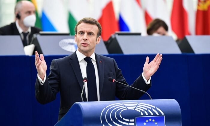 France's President Emmanuel Macron addresses a plenary session at the European Parliament to present the program of activities of the French Presidency as France currently holds the European Union rotating presidency, in Strasbourg, eastern France, on Jan. 19, 2022. (Bertrand Guay/AFP via Getty Images)