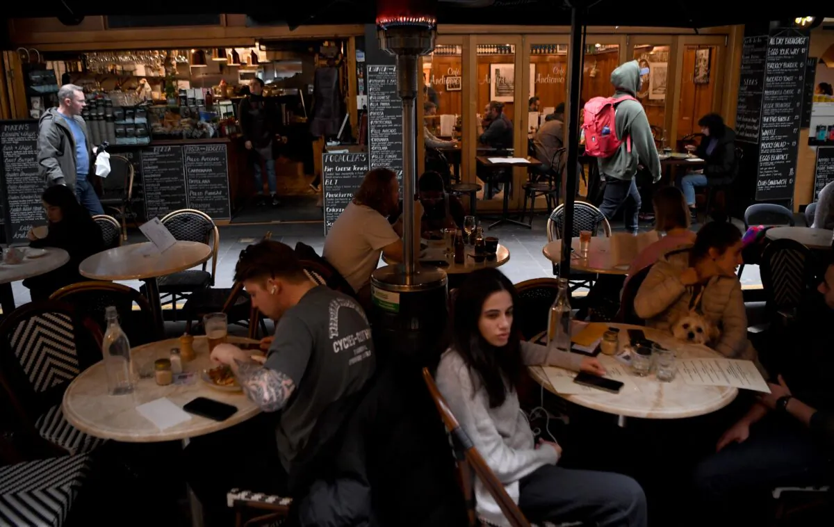 People dine in a cafes in Melbourne's central business district in Melbourne, Australia, on May 11, 2021. (William West/AFP via Getty Images)