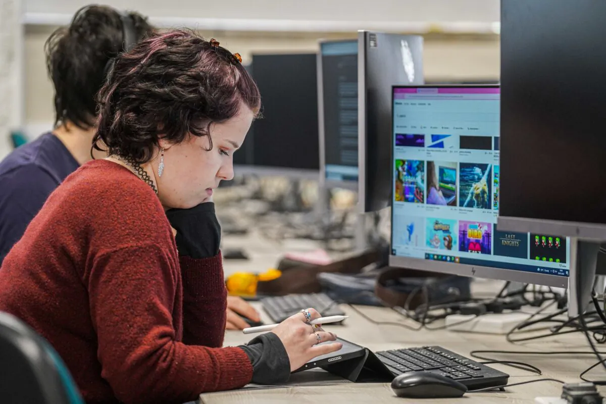 A woman at her computer at the Games Academy of Falmouth University in Falmouth, Cornwall, England, on Jan. 29, 2022. (Hugh Hastings/Getty Images.)