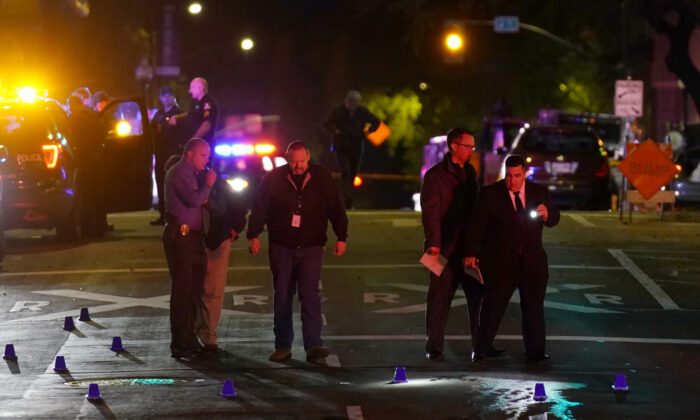 Authorities search area of the scene of a mass shooting with multiple deaths in Sacramento, Calif., on April 3, 2022. (Rich Pedroncelli/AP Photo)