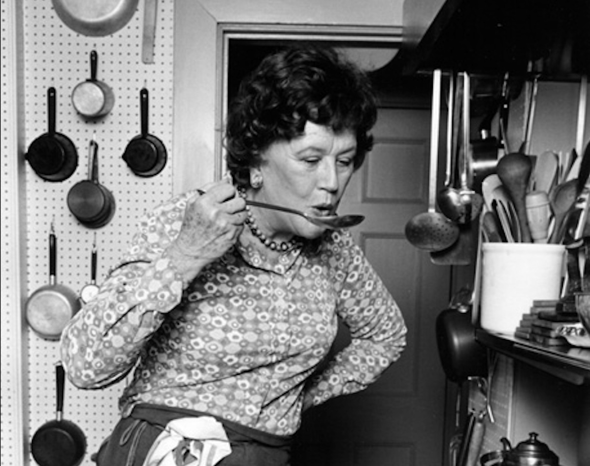Julia Child cooking in her kitchen in 1978. (Public Domain)