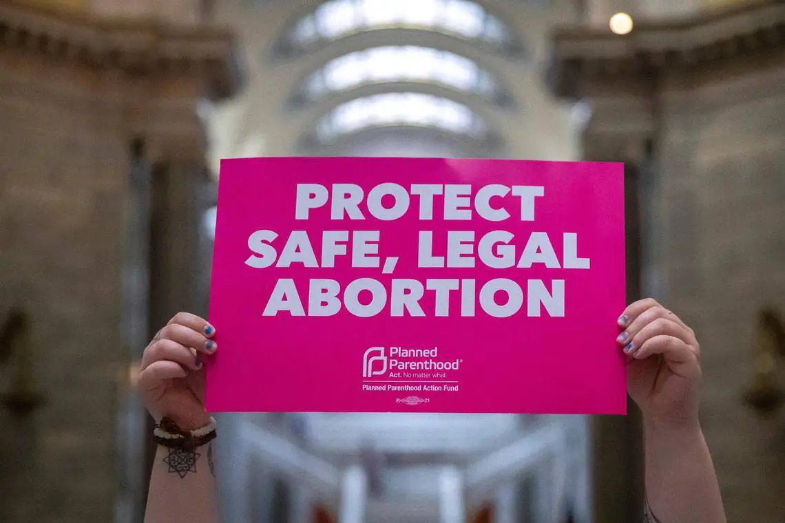 Jace Peters-White of Lexington protests at the Kentucky state Capitol in Frankfort, Ky., on April 13, 2022. Protesters chanted “Bans off our bodies” as they anticipated Kentucky Gov. Andy Beshear’s veto of a sweepingly restrictive abortion bill, HB3, would be overridden. (TNS)