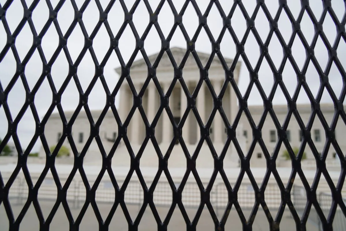 Newly installed barricades block the Supreme Court in Washington on May 5, 2022. (Jackson Elliott/The Epoch Times)