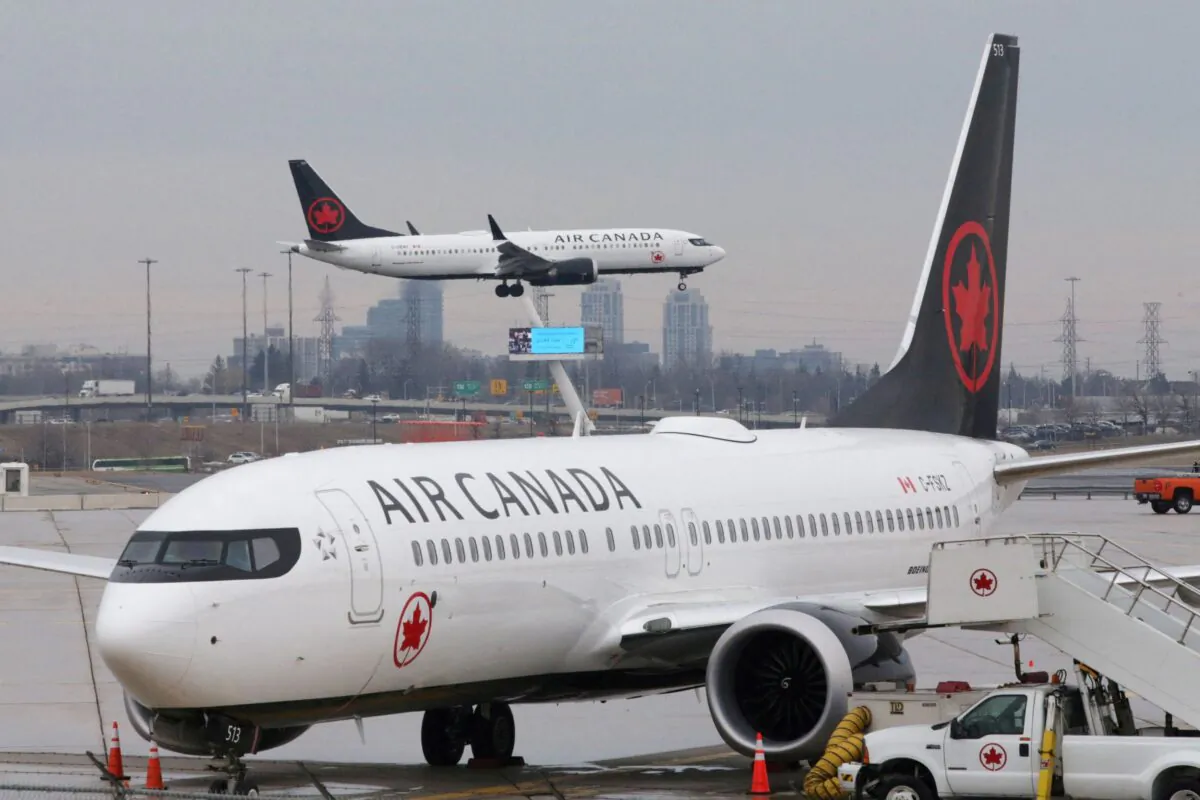 An Air Canada Boeing 737 MAX 8 approaches for landing at Toronto Pearson International Airport in Toronto, Ontario, on March 13, 2019. (Reuters/Chris Helgren)