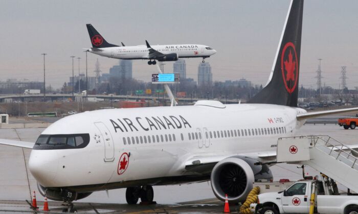 An Air Canada Boeing 737 MAX 8 approaches for landing at Toronto Pearson International Airport in Toronto, Ontario, Canada, March 13, 2019.  (Reuters/Chris Helgren)