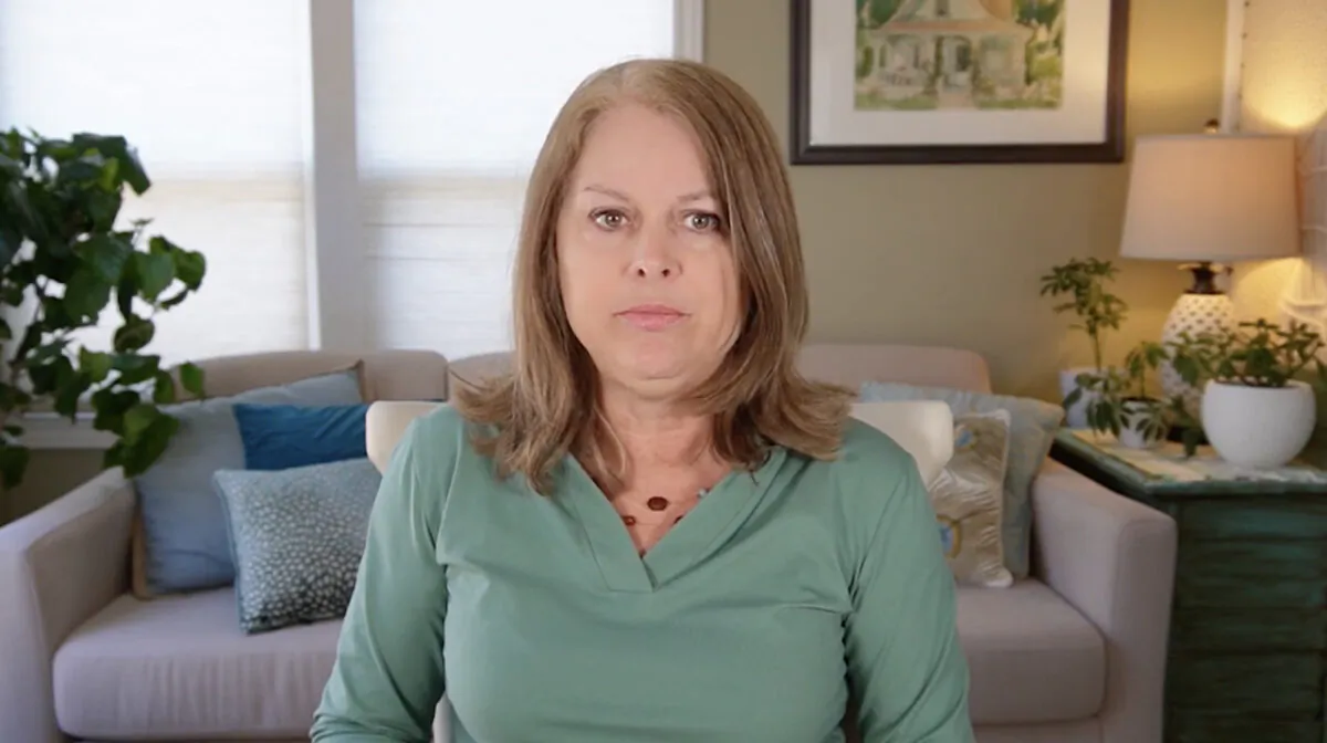 Carolyn Burjoski, a former Waterloo Region District School Board teacher, was ejected from a school board meeting in January 2022 after raising questions about the age-appropriateness of some books in elementary school libraries that deal with gender transition. She said she is filing a $1.7 million lawsuit against WRDSB on May 4, 2022. (Screenshot via The Epoch Times)