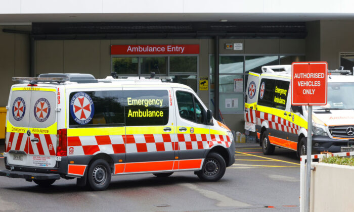 Ambulances arrive at St Vincent's Hospital in Sydney, Australia on December 28, 2021. (Photo by Jenny Evans/Getty Images)