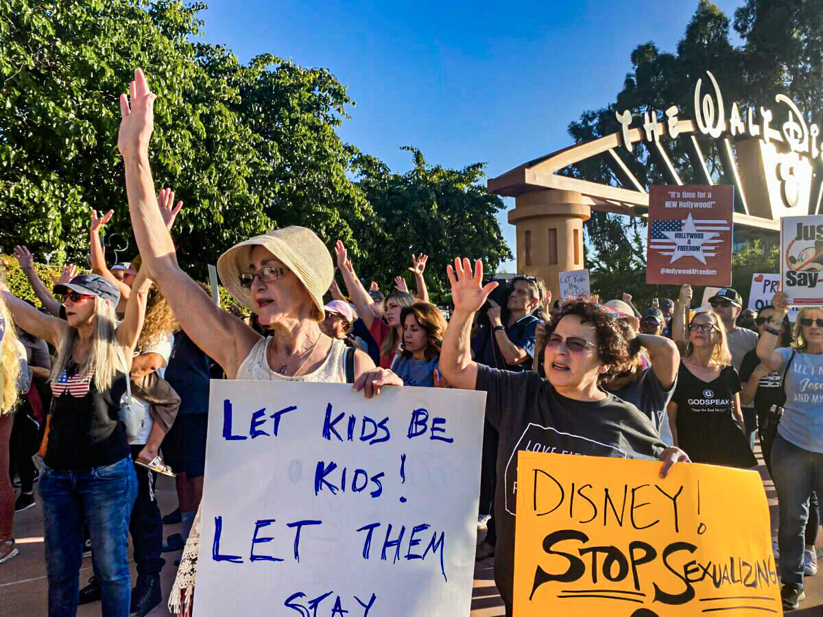 Protesters rally in opposition to The Walt Disney Company's stance against a recently passed Florida law outside of the company's headquarters in Burbank, Calif., on April 6, 2022. (Jill McLaughlin/The Epoch Times)