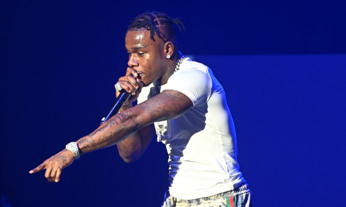 Rapper DaBaby performs onstage during "Rolling Loud Presents: DaBaby Live Show Killa" tour at Coca-Cola Roxy in Atlanta on Dec. 4, 2021. (Paras Griffin/Getty Images)