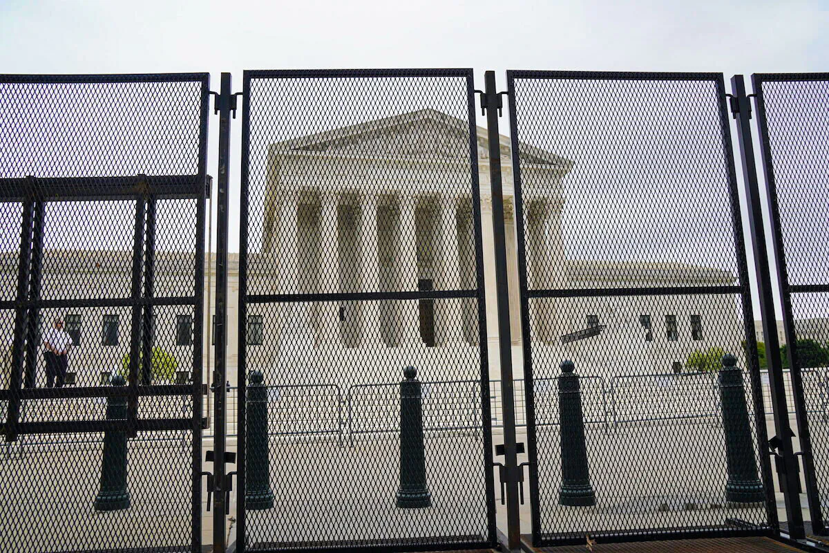 Tall, heavy barricades surround the U.S. Supreme Court in Washington, D.C. on May 5, 2022 (Jackson Elliot/The Epoch Times)