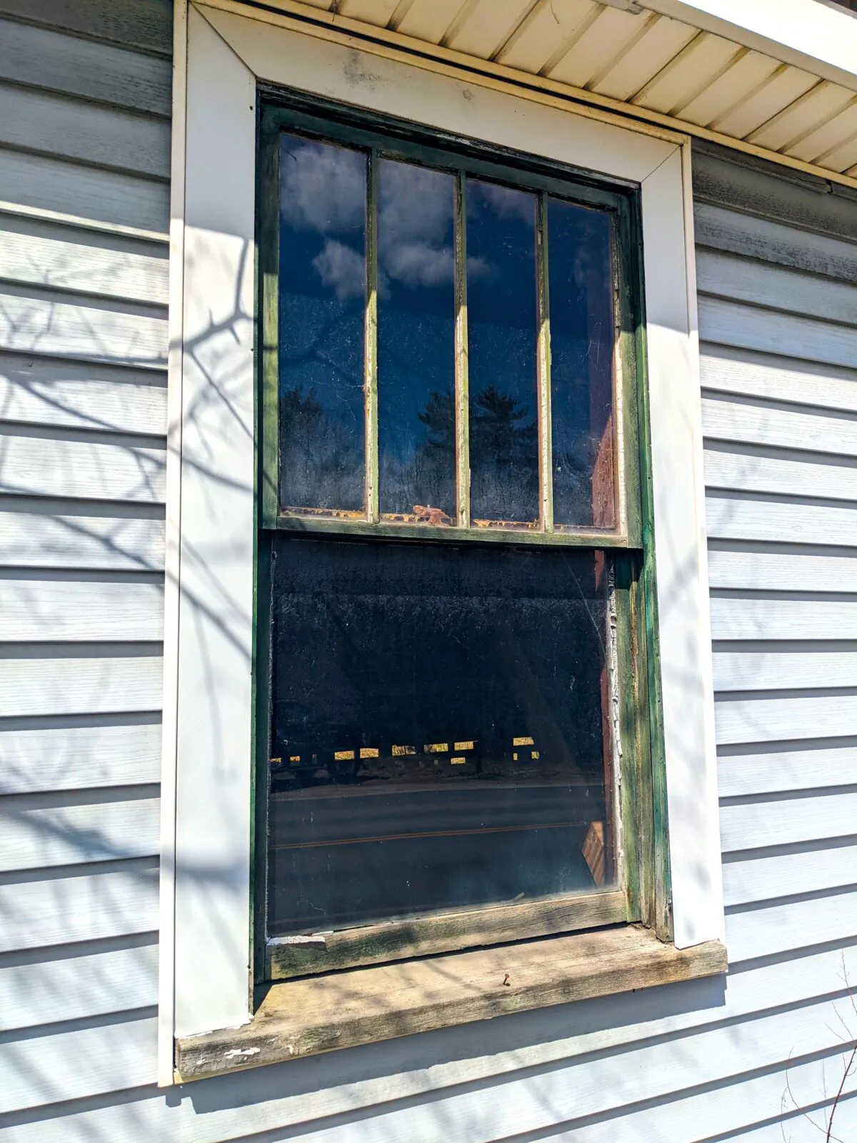 This older window still works fine. Does it make sense to replace it, and all the others in the house, with newer, more efficient, ones? Maybe not. (Tim Carter/TNS)
