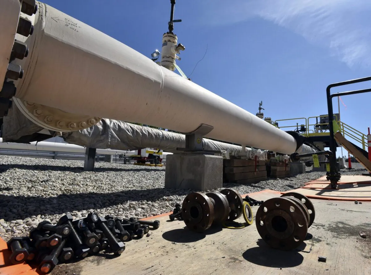 In this June 8, 2017, file photo, fresh nuts, bolts and fittings are ready to be added to the east leg of the Enbridge Line 5 pipeline near St. Ignace, Mich., as Enbridge prepares to test the east and west sides of the Line 5 pipeline under the Straits of Mackinac in Mackinaw City, Michigan. (The Canadian Press/Detroit News-Dale G. Young)