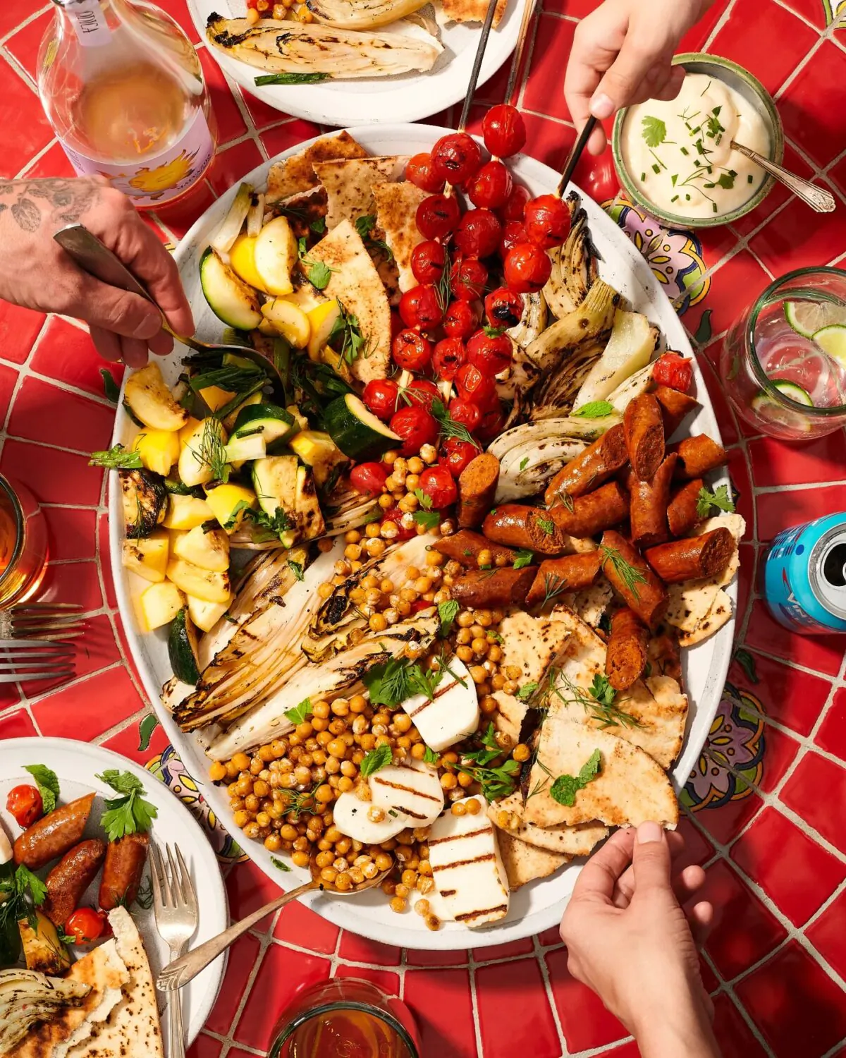 A delicious platter of grilled mixed vegetables, merguez sausage, halloumi cheese, and crispy chickpeas. (Jason Rampe/TNS)