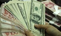 China’s State Media Claims De-Dollarization Improves RMB’s International Status