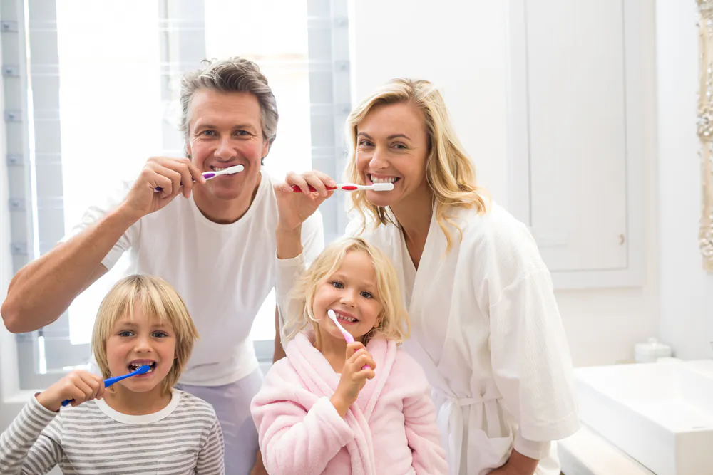 We need to brush slowly and carefully at the gum line, usually with small circular movements, as harsh sideways movements can result in the gums being pushed away from the teeth. (ShutterStock)