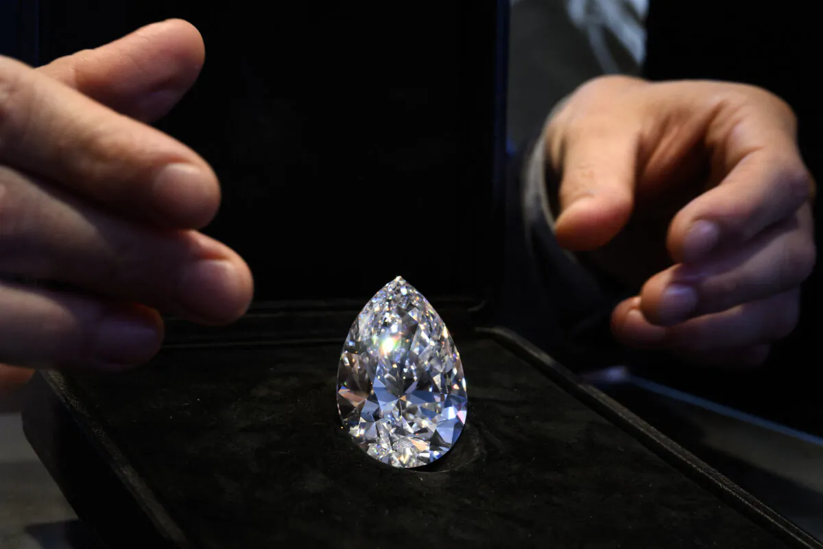 "The Rock," a 228.31-karat pear-shaped white diamond, during a preview at Christie's in Geneva on May 6, 2022, before its auction sale. (Fabrice Coffrini/AFP via Getty Images)
