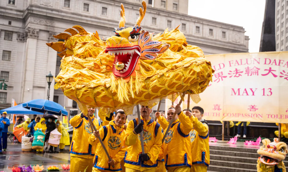 Falun Gong practitioners take part in an event to celebrate World Falun Dafa Day in Foley Square in New York City on May 7, 2022. (Samira Bouaou/The Epoch Times)